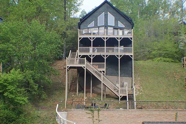 Norris Lake Cabin Rental | Blue Water Lodge — Sleeps 20 | View of Back of House from Dock | Norris Lake Villas | Norris Lake House Rental | Norris Lake Cabin Rental | Norris Lake Vacation Rental | Tennessee Lake House Rental | Tennessee Lake Vacation Rental | Tennessee Lake Cabin Rental | Norris Lake House Property Management|